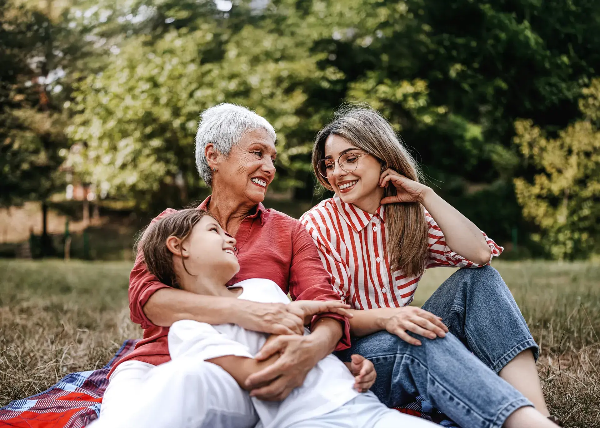 Family on a picnic blanket